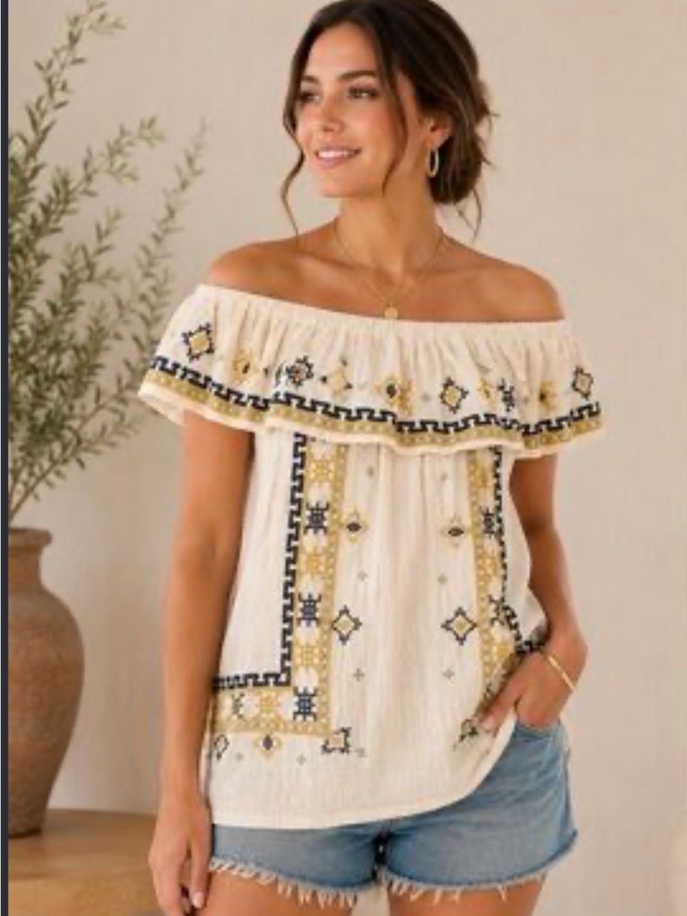 Easel off the shoulder embroidered top size small